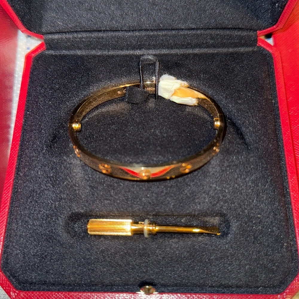 Cartier yellow gold love bracelet size 17 brand new. Never worn